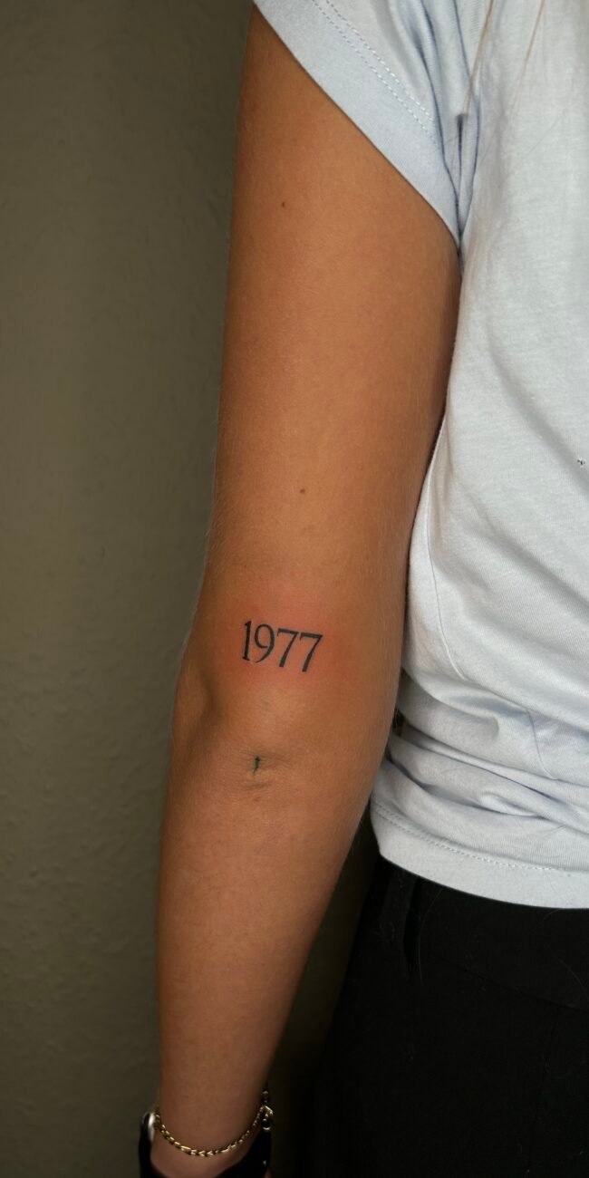 tattoo 1977 op arm